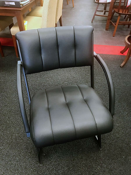 black leather chair with handles
