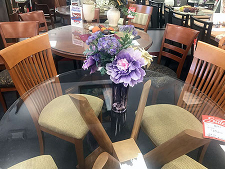 glass table with wood chairs
